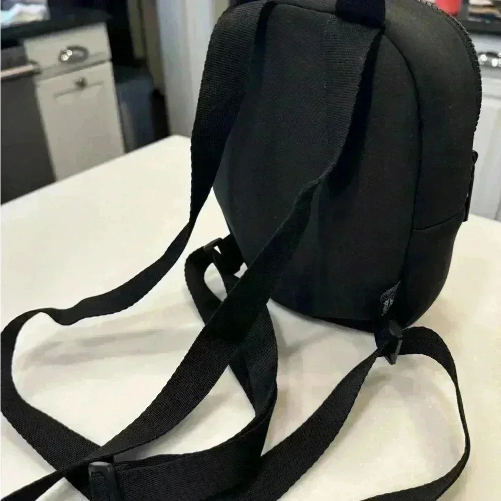 Reebok mini neoprene back pack adjustable straps front zip compartment